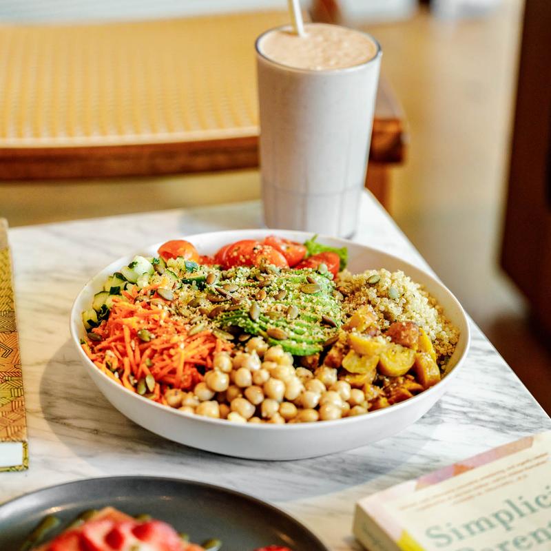 The Love Life Salad bowl with chickpeas, avocado and fresh vegetables.